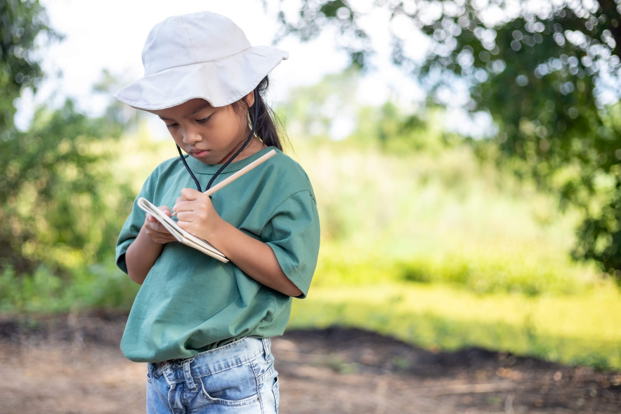 a kid journaling what the weather is like